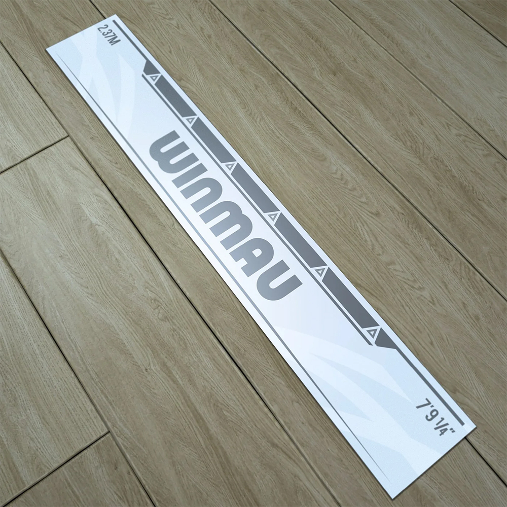 White self-adhesive Winmau throw line, placed diagonally on a light wooden floor. Grey markings show the ‘Winmau’ logo and distances 2.37 m and 7'9 ¼". Small triangles aid precise foot placement for darts.