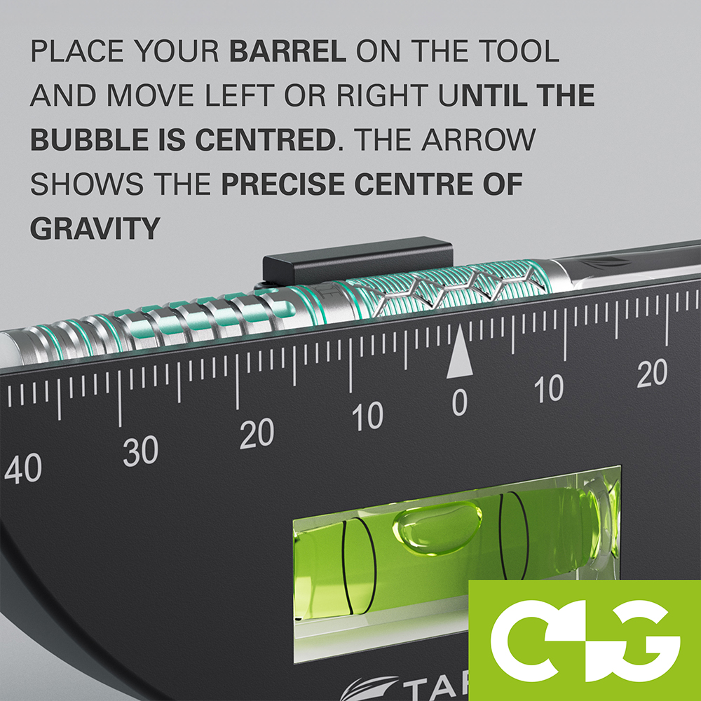 Target Centre of Gravity Tool with a silver dart barrel on the scale. A green spirit level indicates an off-centre bubble. The dart is moved to find the precise centre of gravity by centring the bubble.