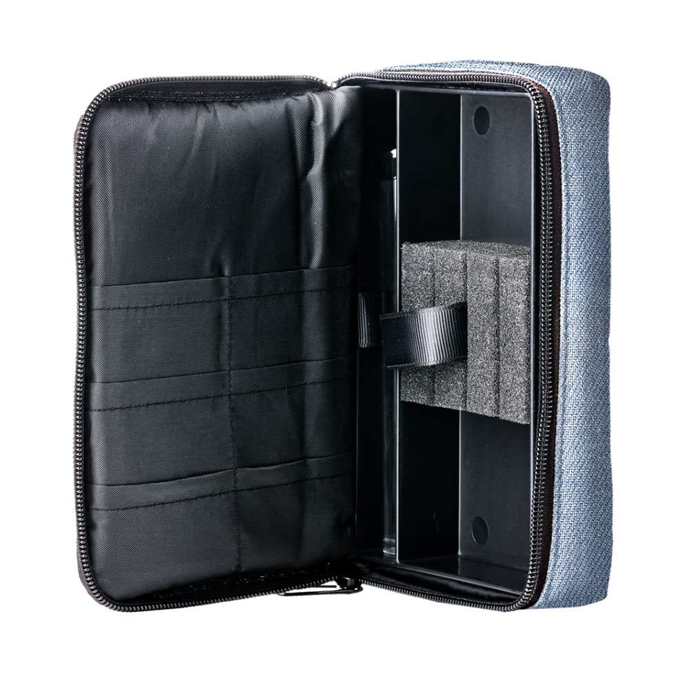 Open-top darts case in a denim look: black plastic shell inside with compartments for darts and accessories. Grey foam insert with Velcro fastening secures assembled darts. Left-hand side: slip pockets for flights, shafts and tips.