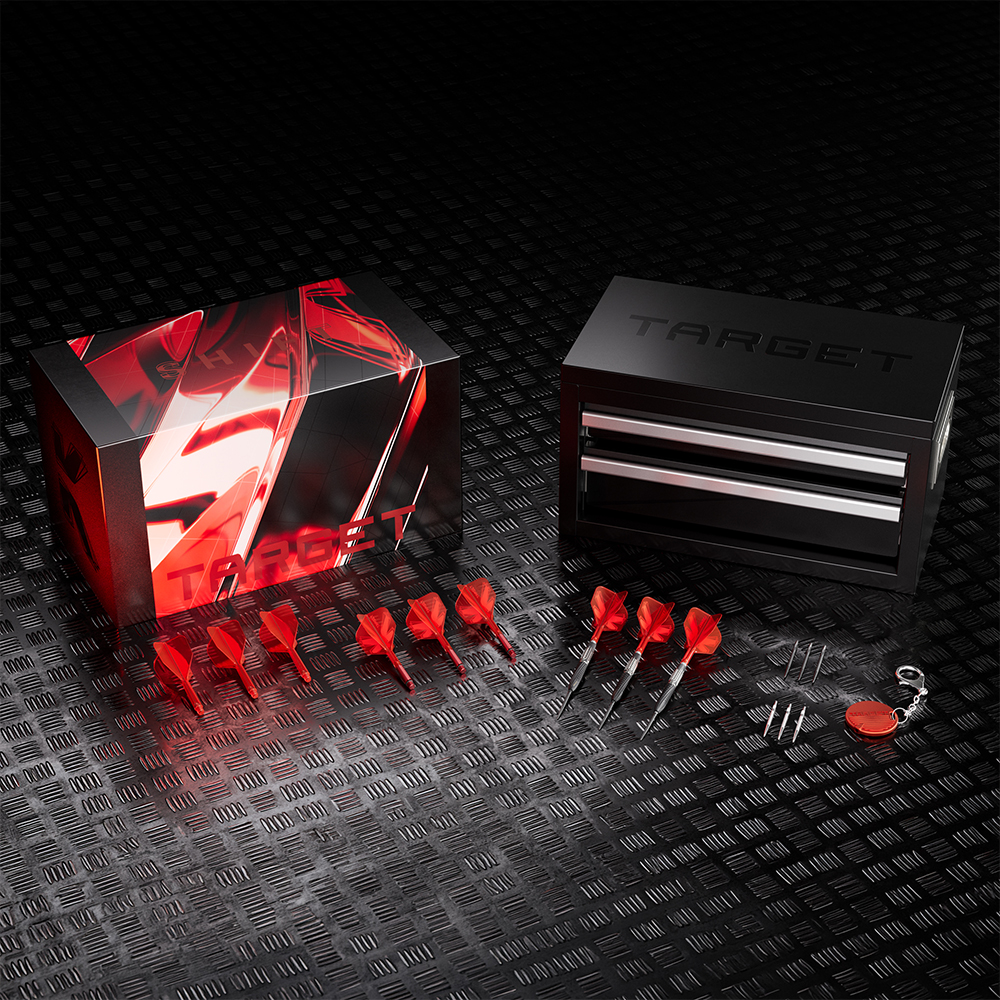 Target Shift 90% SP steel dart set on a dark metal base. Includes a graphic box, a black mini toolbox with the Target logo, 3 ready-to-use steel darts with red K-Shift flights, loose flights, Swiss GRD Point tips and a red SP key.