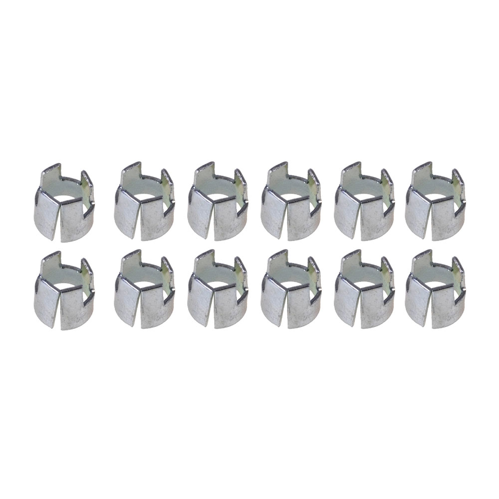 Douze couronnes en aluminium brillant à fixer sur les tiges des fléchettes. Chacune a six pointes verticales et une base ouverte pour l'enfilage. Disposées en deux rangées de six sur fond blanc, pour maintien et protection des ailettes.