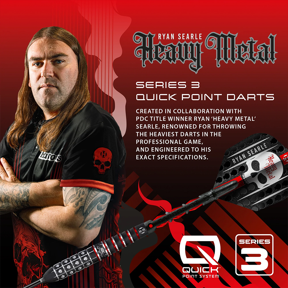 Darts player Ryan Searle is pictured with his hair down and arms crossed. Next to him is a black Harrows steel-tip dart from the Ryan Searle Series 3, with red accents, skull motifs on barrel and flight, and Quick Point System. Red.